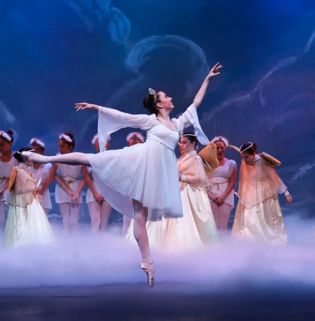 Toy soldier and young dancer performing on stage at Victoria Ballet Nutcracker 2021